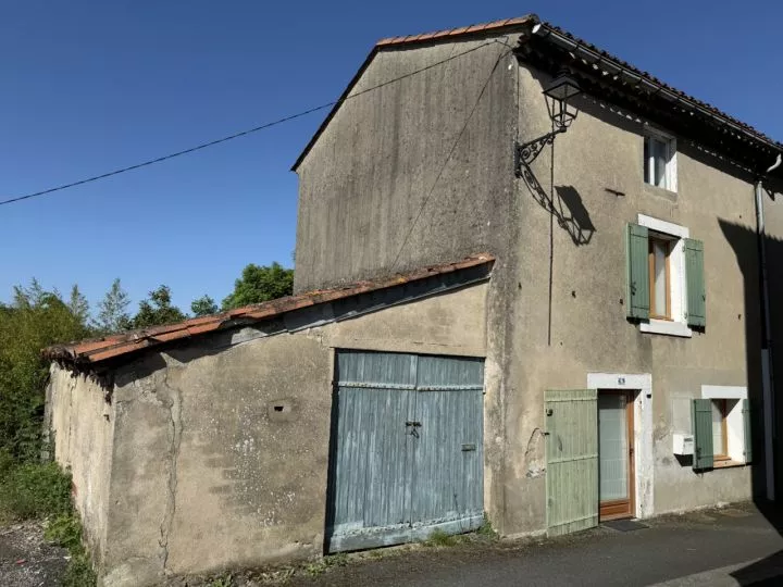 Maison de village avec sortie et garage